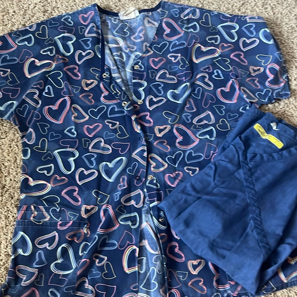 two scrub tops
